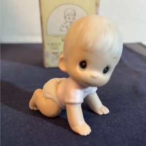 Precious moments baby crawling